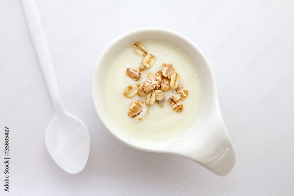 Close up natural creamy white yogurt in cup