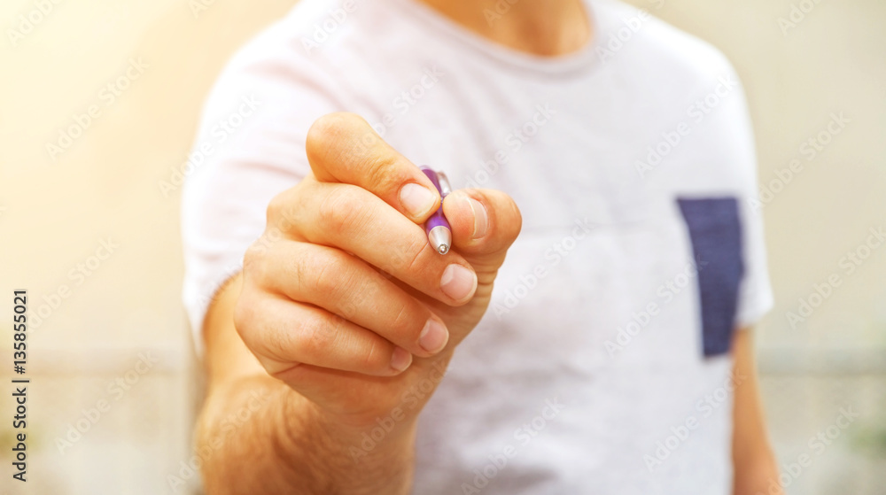 Man writing with a pen