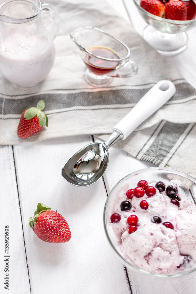 organic homemade ice cream in glass bowl on wooden background