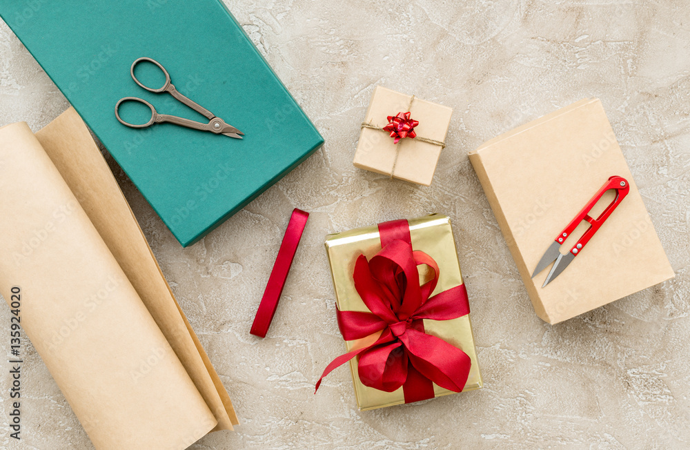 wrapping gifts in box for holiday top view mock up