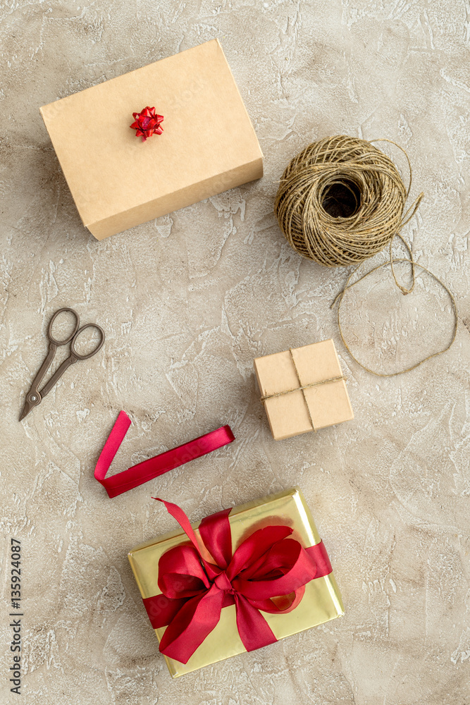 wrapping gifts in box for holiday top view mock up