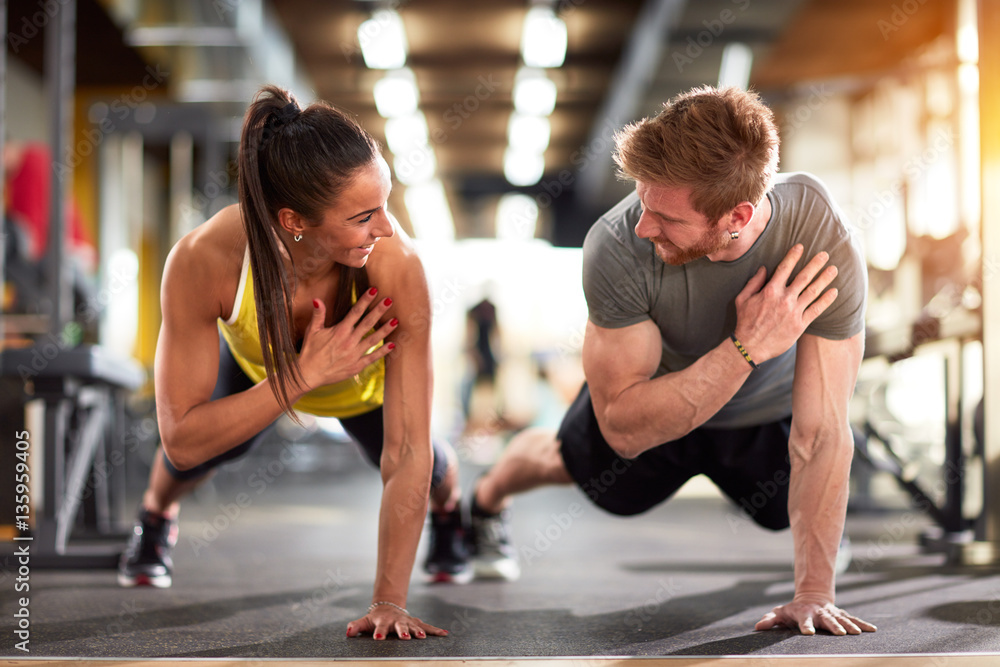 Man and woman exercising