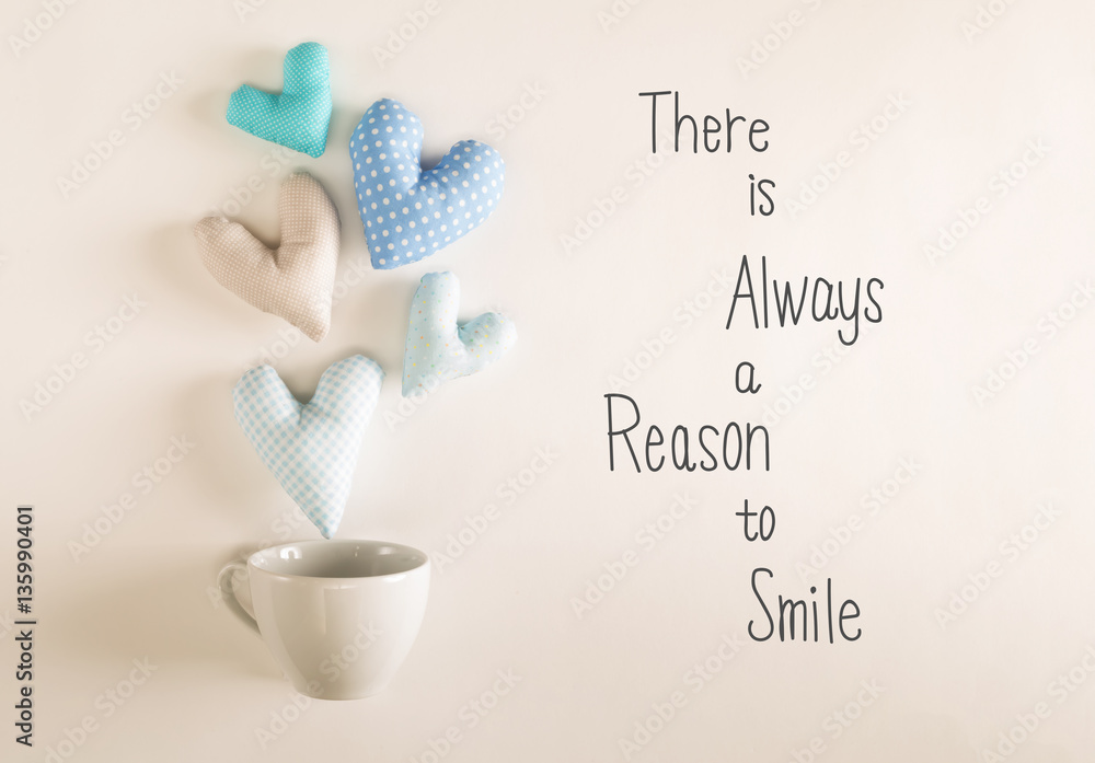 There Is Always A Reason To Smile message with blue heart cushio