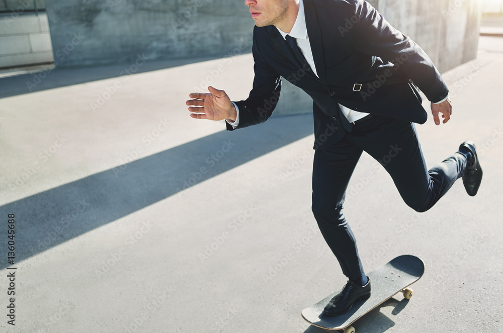 Businessman on a skateboard rushing to an assembly