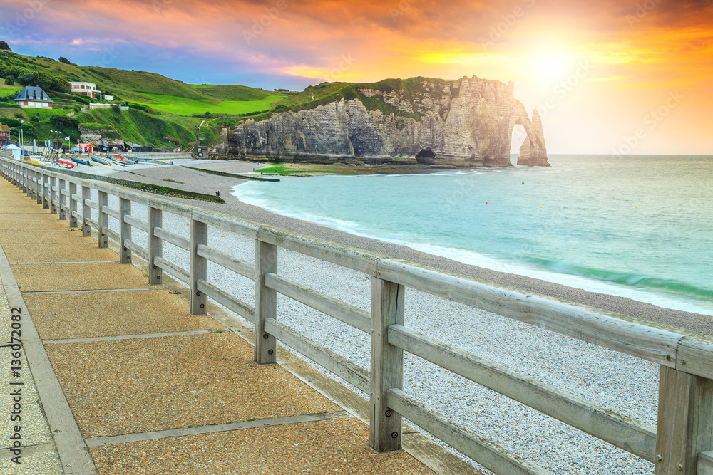 Spectacular gravel beach and magical colorful sunset Etretat, Normandy, France