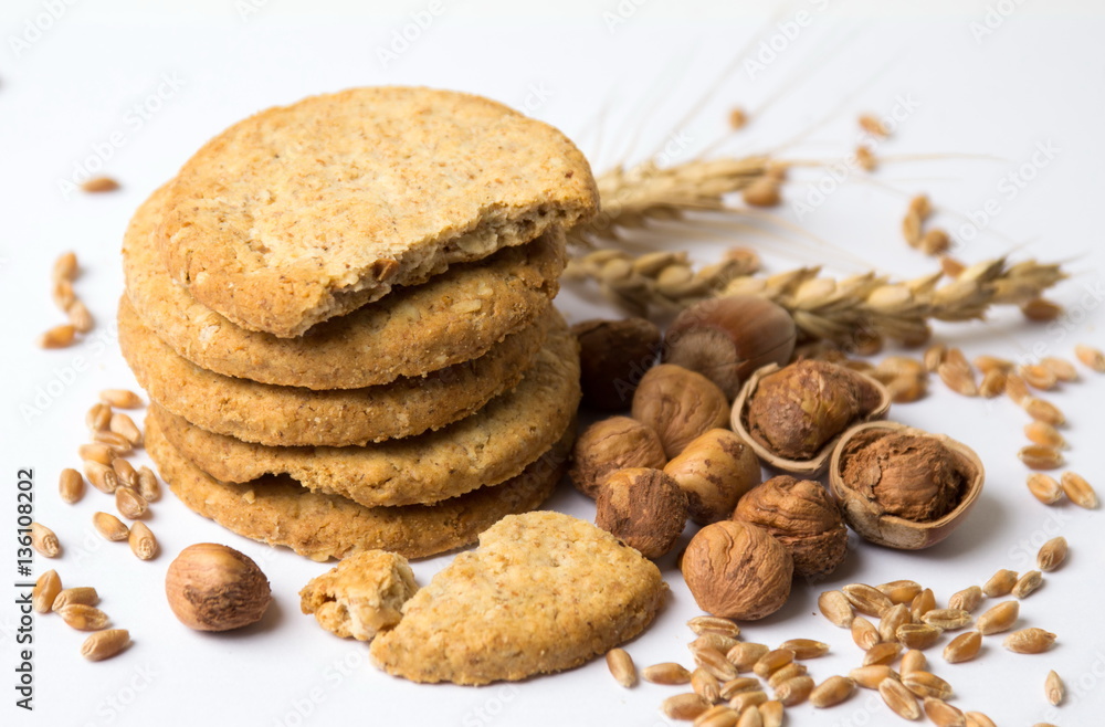 Integral cookies with hazelnuts and linseed on white