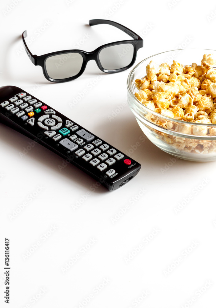 concept of watching movies with popcorn white background