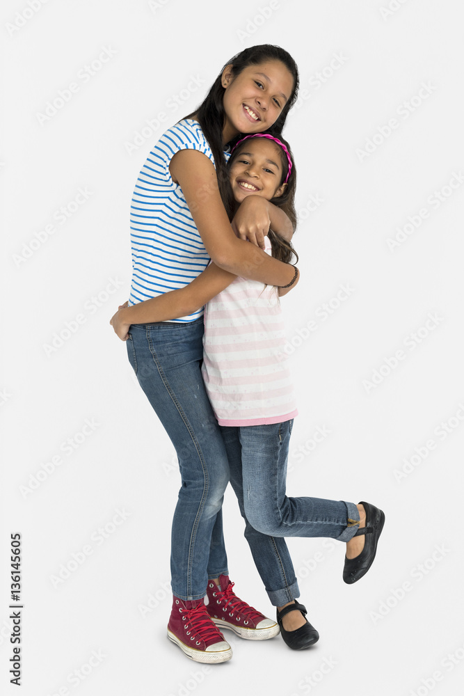 Two Asian Girl Sisters Hugging Togetherness Concept