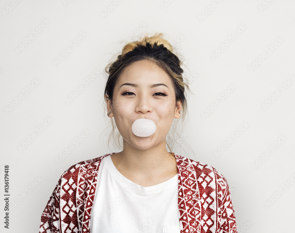 Young Girl Chewing Bubble Gum Concept