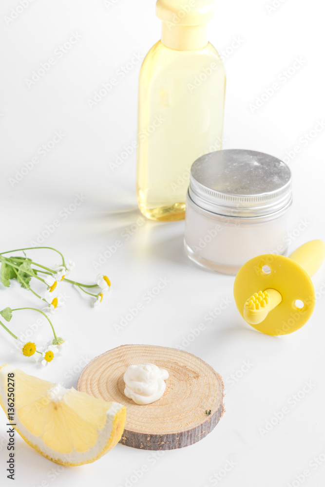 natural organic cosmetics with herbs for baby on white background