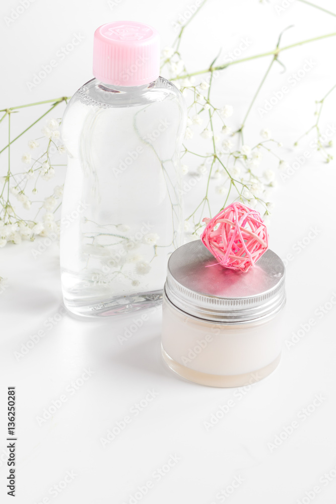 natural organic cosmetics with herbs for baby on white background