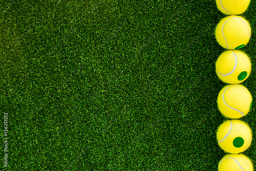 tennis ball on green background top view mock up