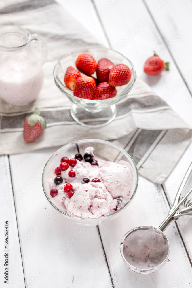 organic homemade ice cream in glass bowl on wooden background