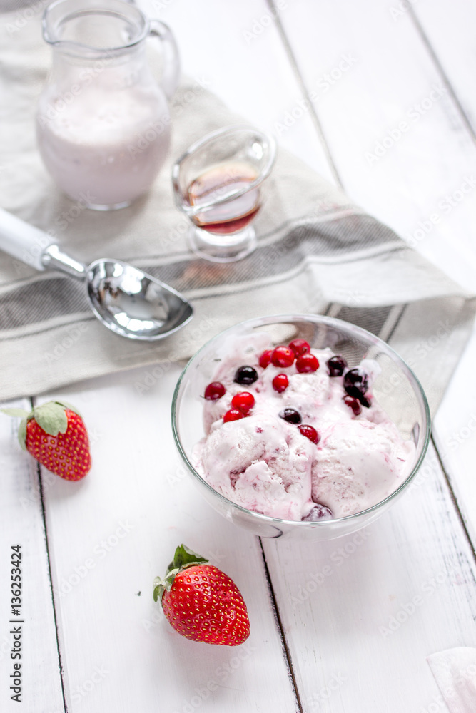 organic homemade ice cream in glass bowl on wooden background