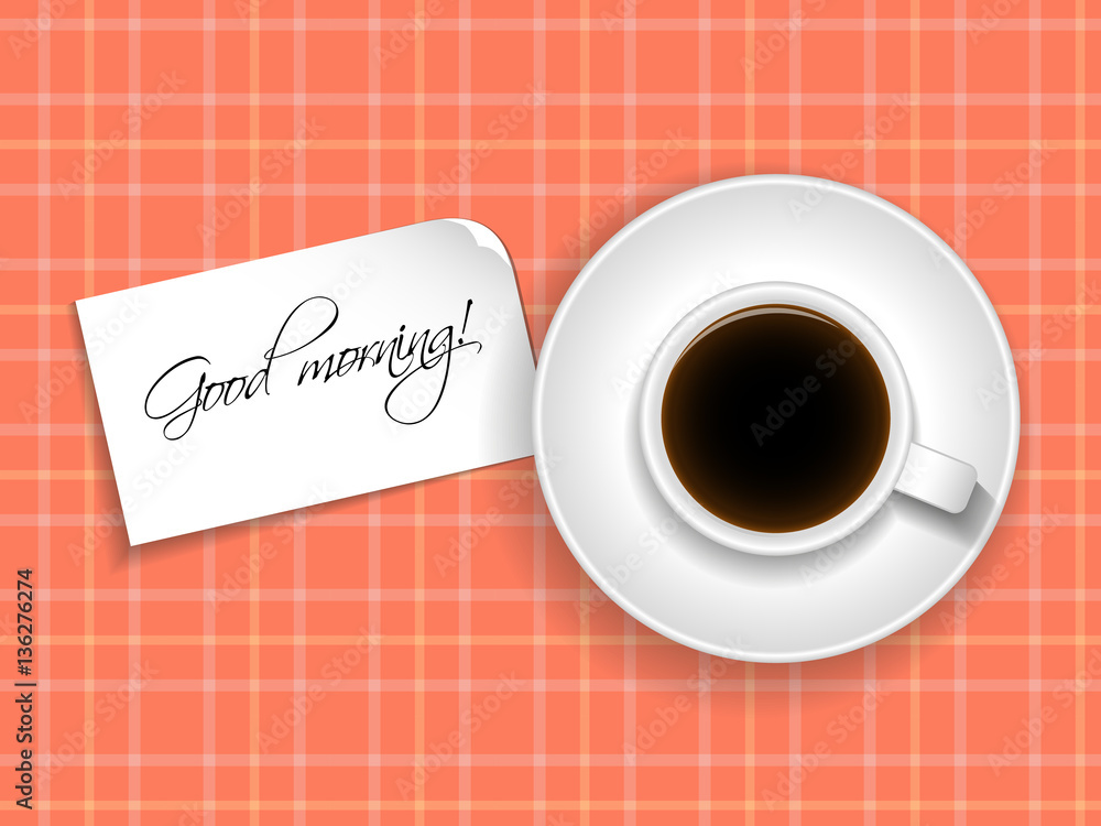 Cup of coffee with a note that says good morning!