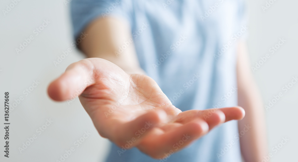 Businessman showing his empty hand