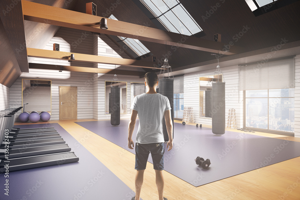 Man in gym interior