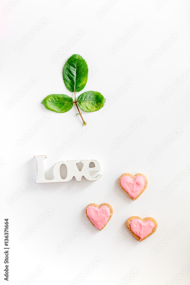 cookies for Valentine Day heartshaped white background top view pattern