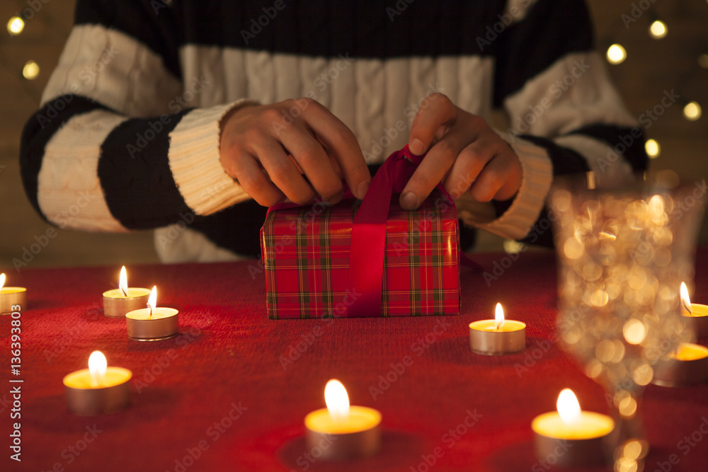 Men are opening gifts