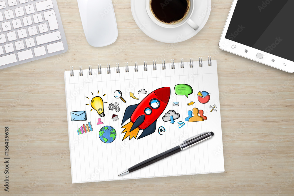 Red hand drawn rocket with icons on office background