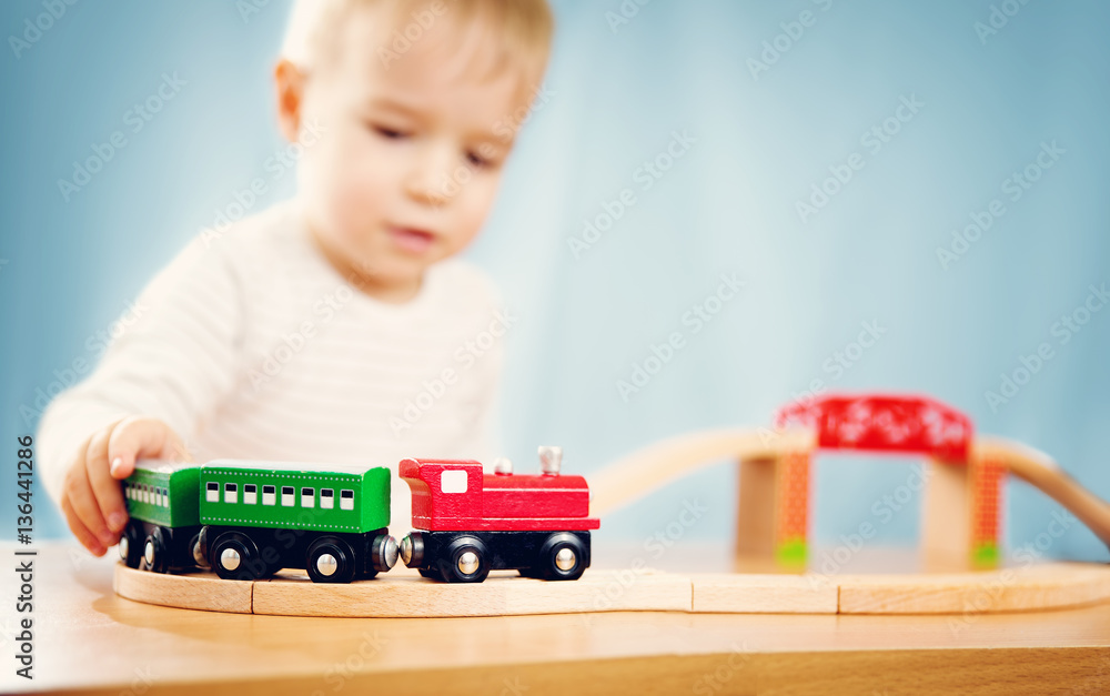 Portrait of a two years old child sitting at the table