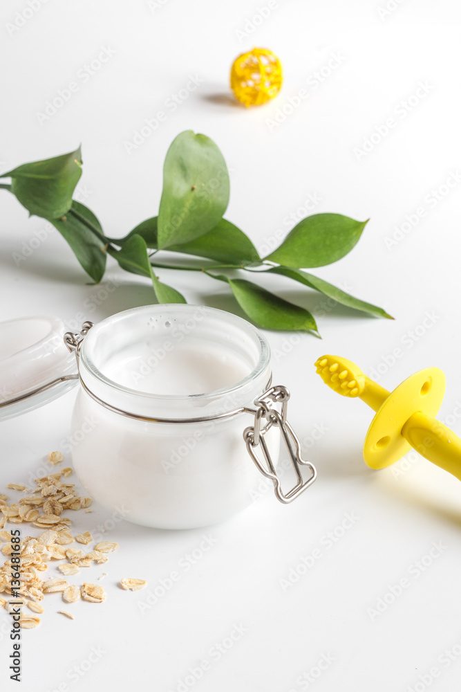 natural organic cosmetics with herbs for baby on white background