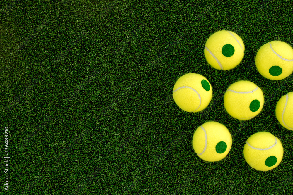 tennis ball on green background top view mock up