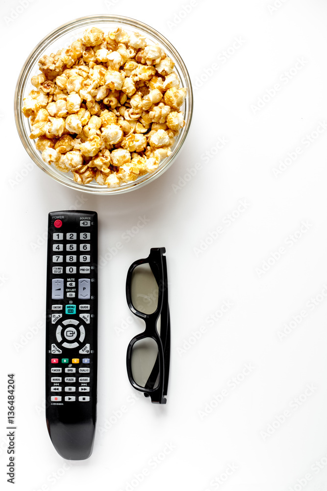 concept of watching movies with popcorn top view white background