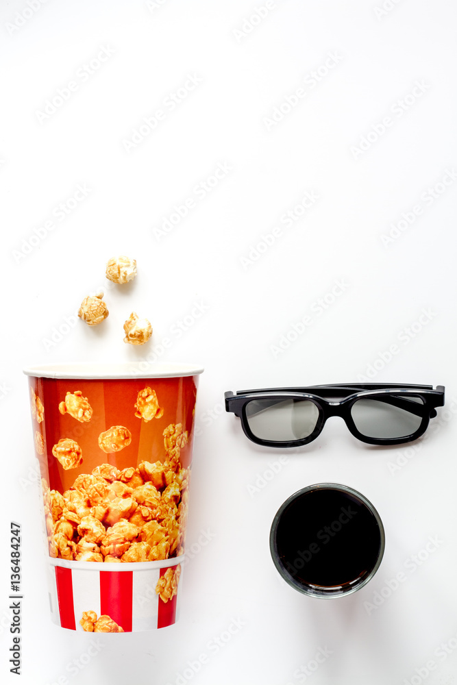 concept of watching movies with popcorn top view white background