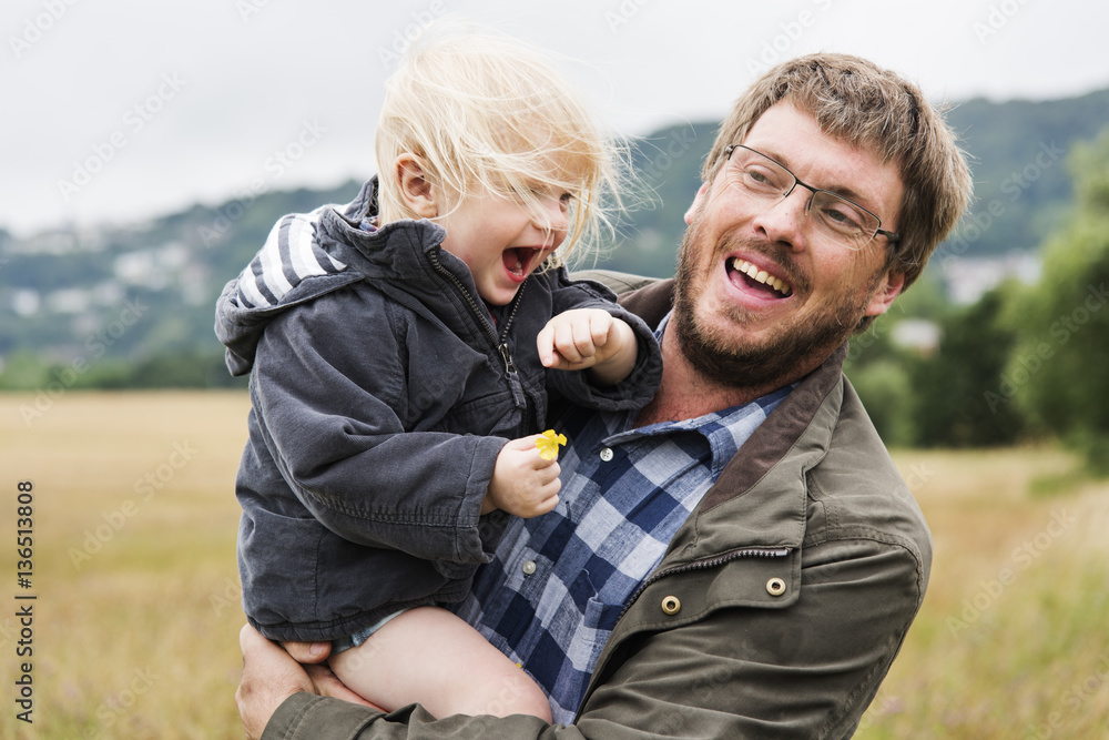 Family Father Son Smiling Togetherness Outdoors Carrying Concept