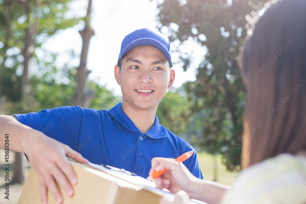 deliveryman stand and smile