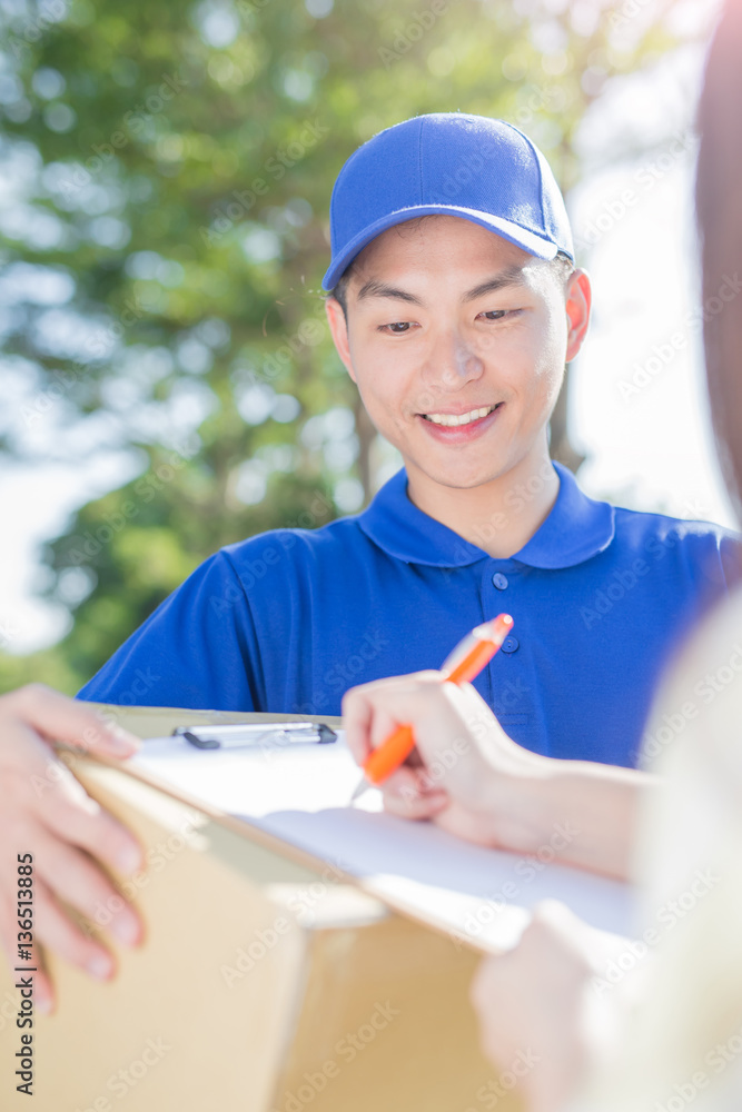 deliveryman stand and smile