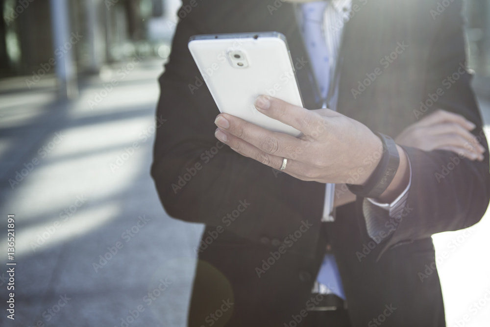 Businessmen are watching smartphone