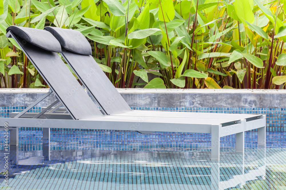 Swimming pool and relaxing seat at Hotel beach resort