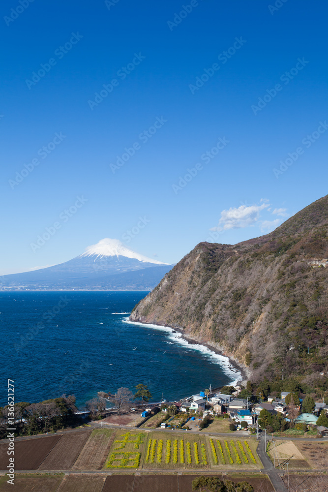 Mountain fuji and Japan sea in winter seen from Izu city , Shizuoka prefecture