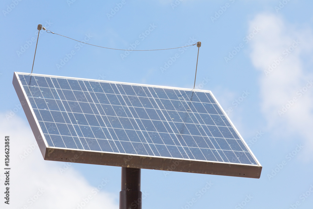 Close - up Street light with solar panel and blue sky