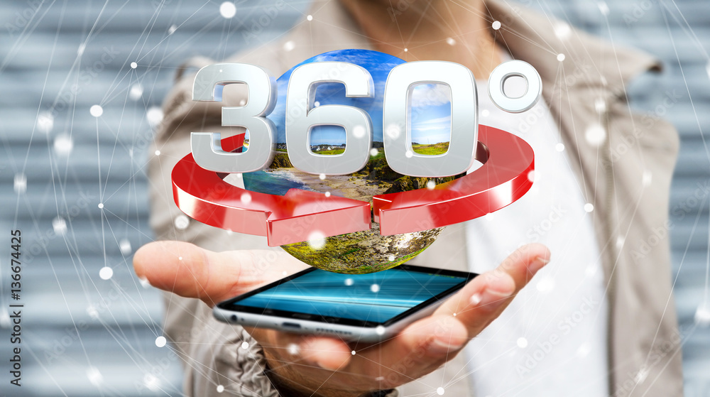 Man holding 360 degree 3D render icon over mobile phone