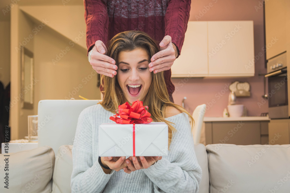 Happy girl receives her gift of valentine.