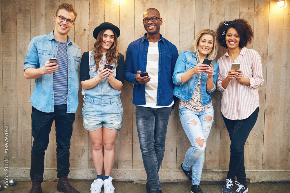 Group of friends with smartphones