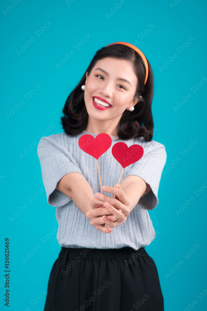 Woman on Valentines Day. Young asian beautiful girl holding red