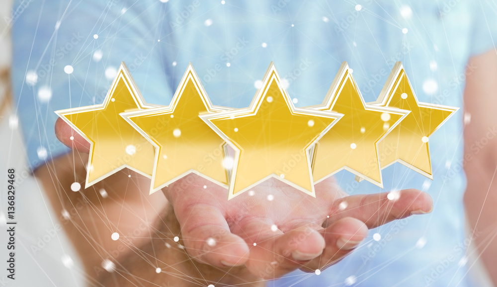 Businessman rating stars with his hand 3D rendering