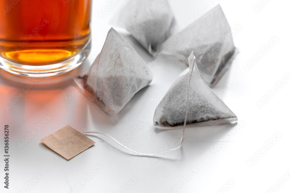 Cup of tea with teabags on white background mock up