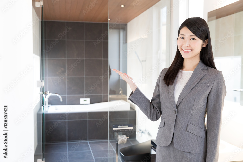 asian businesswoman showing bathroom