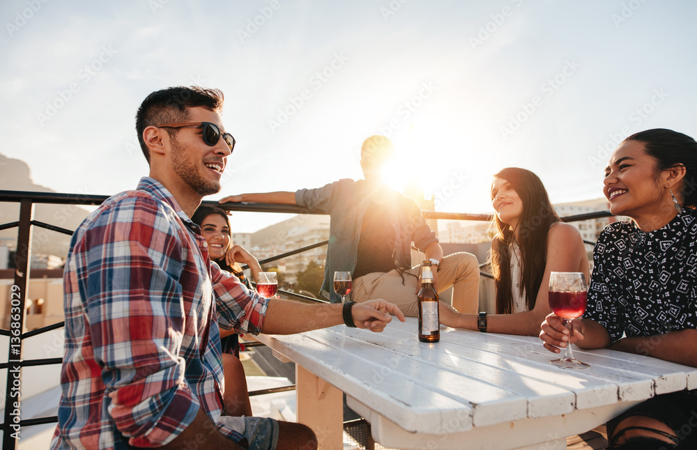 Group of friends at rooftop party