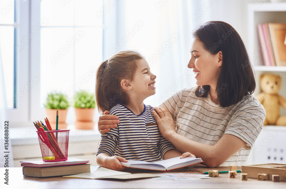 Mom and child reading a book