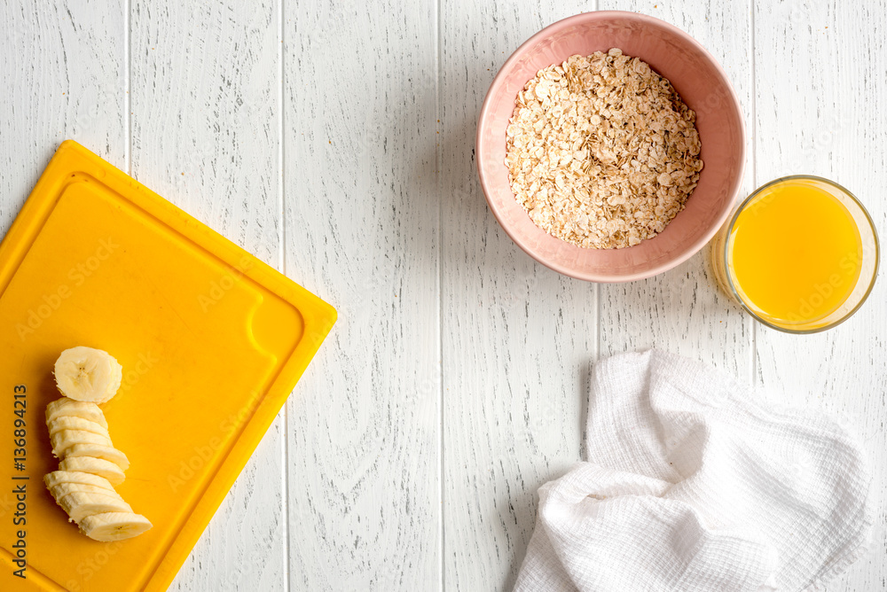 healthy breakfast with porridge on wooden background top view