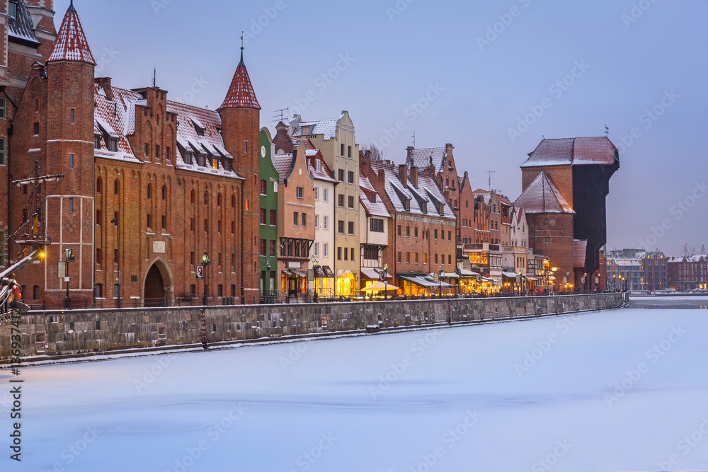 Old town of Gdansk at Motlawa river in snowy winter, Poland