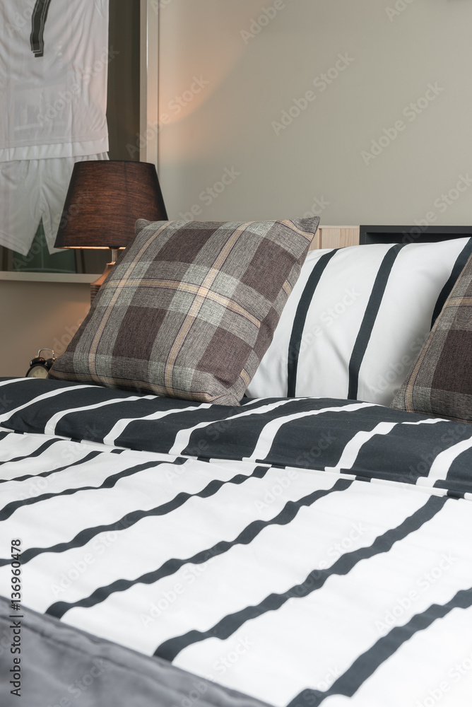 modern bedroom design with black and white blanket