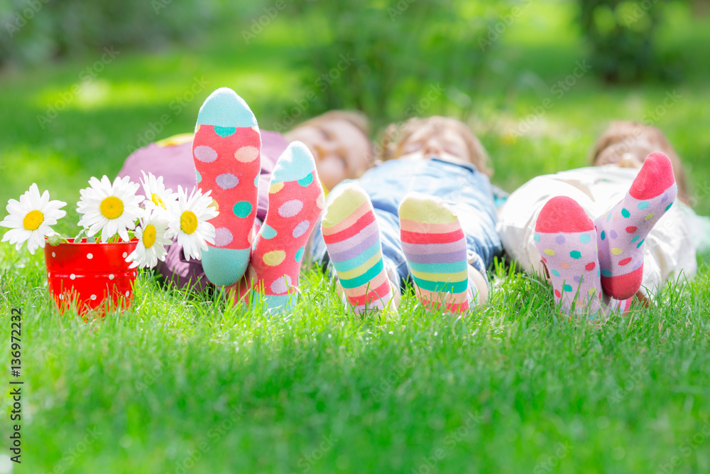 Group of happy children playing outdoors