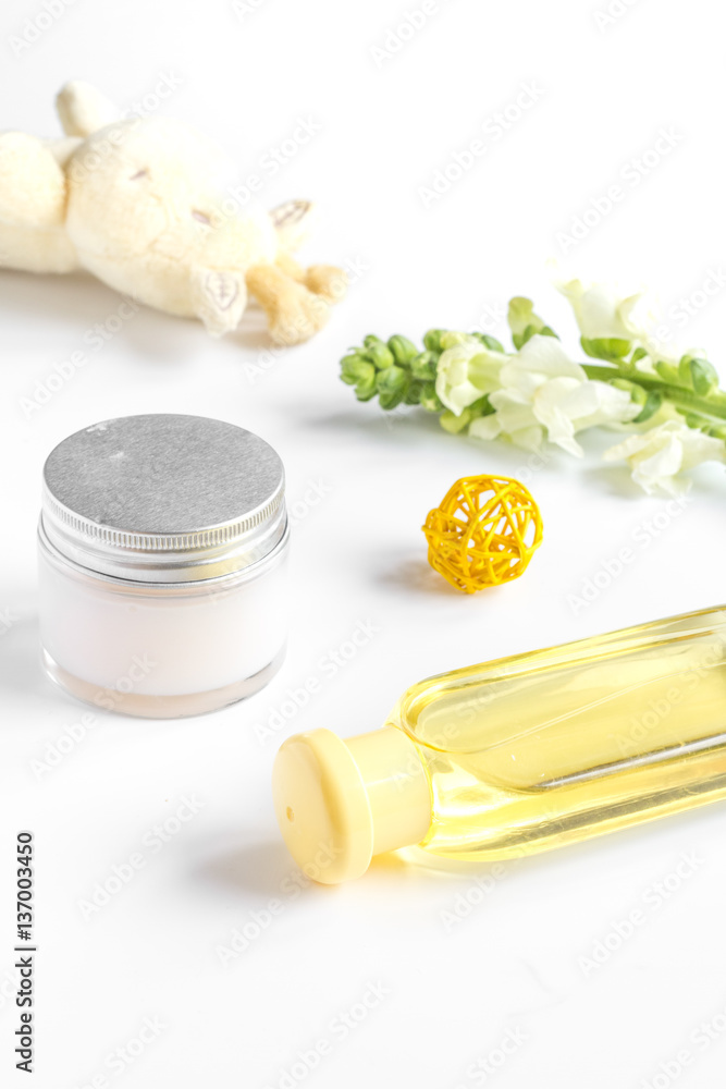 natural organic cosmetics with herbs for baby on white background